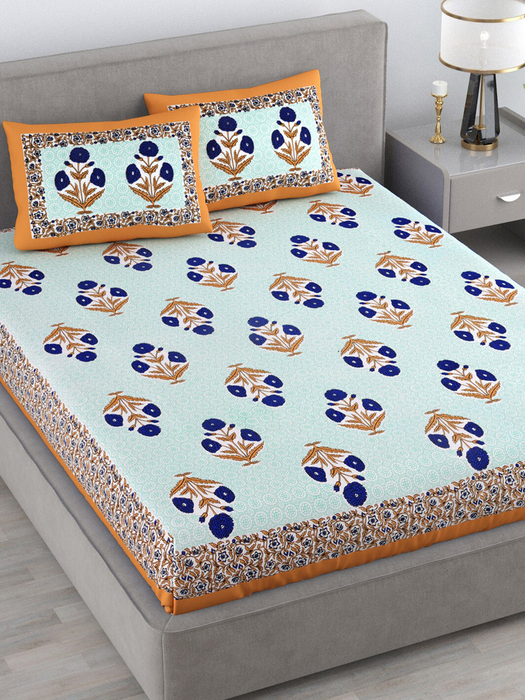 

Varde White & Blue Floral 120 TC Cotton Queen Bedsheet with 2 Pillow Covers
