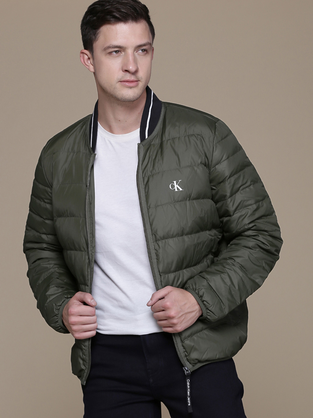 

Calvin Klein Jeans Men Green Solid Puffer Jacket