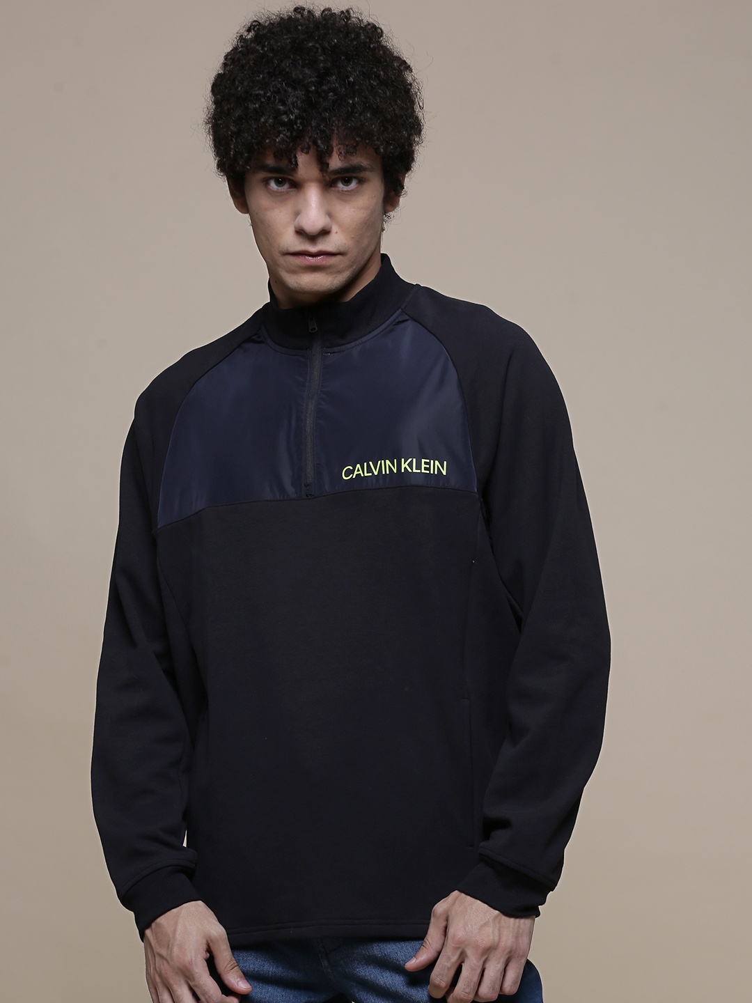 

Calvin Klein Jeans Men Black & Navy Blue Colourblocked Mock Collar Sweatshirt