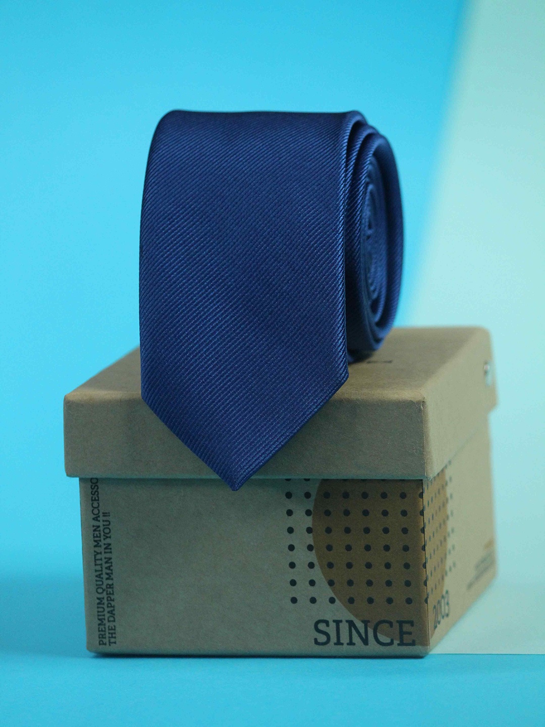 

Tossido Men Blue Solid Skinny Tie