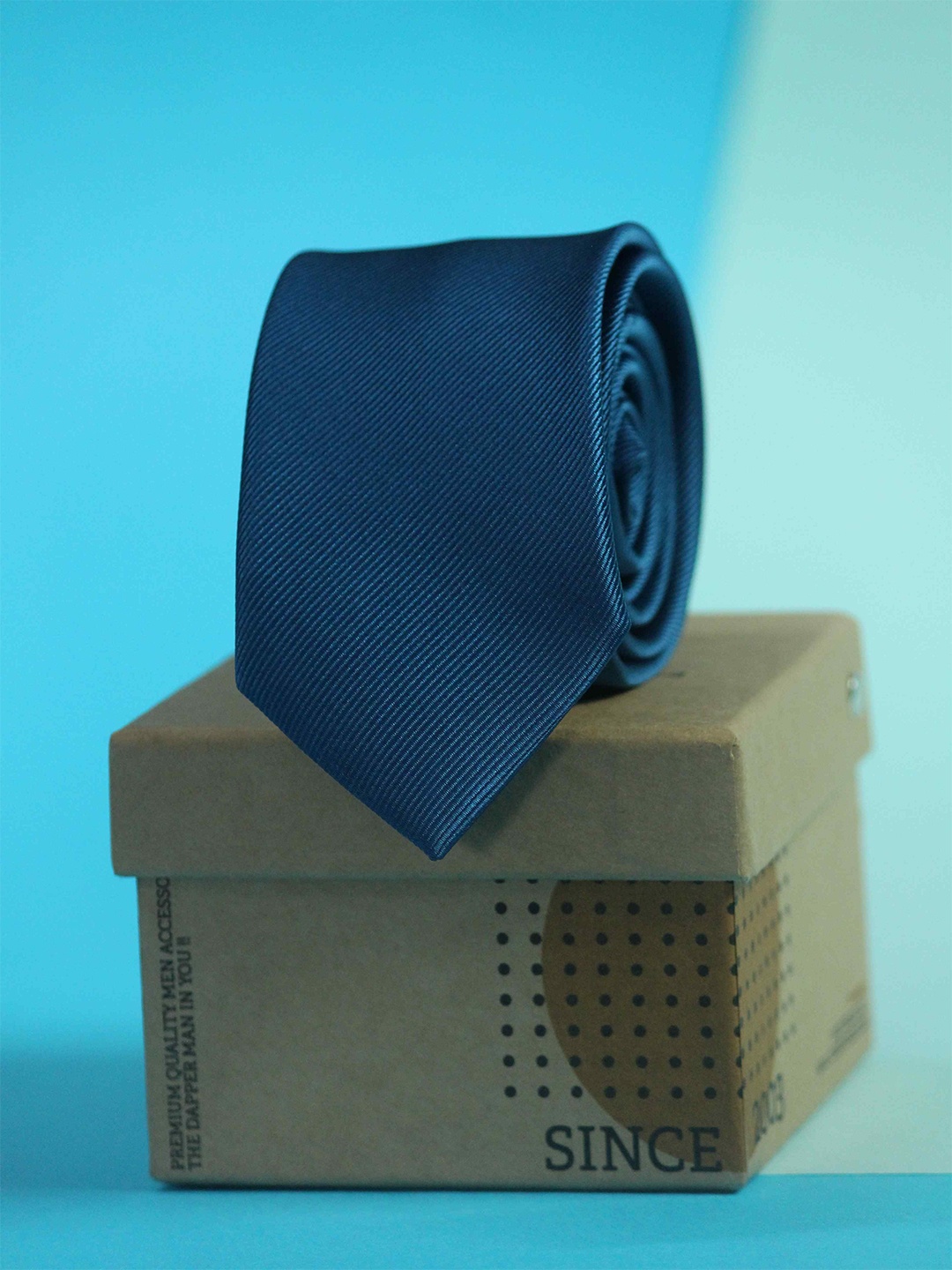 

Tossido Men Blue Solid Skinny Tie