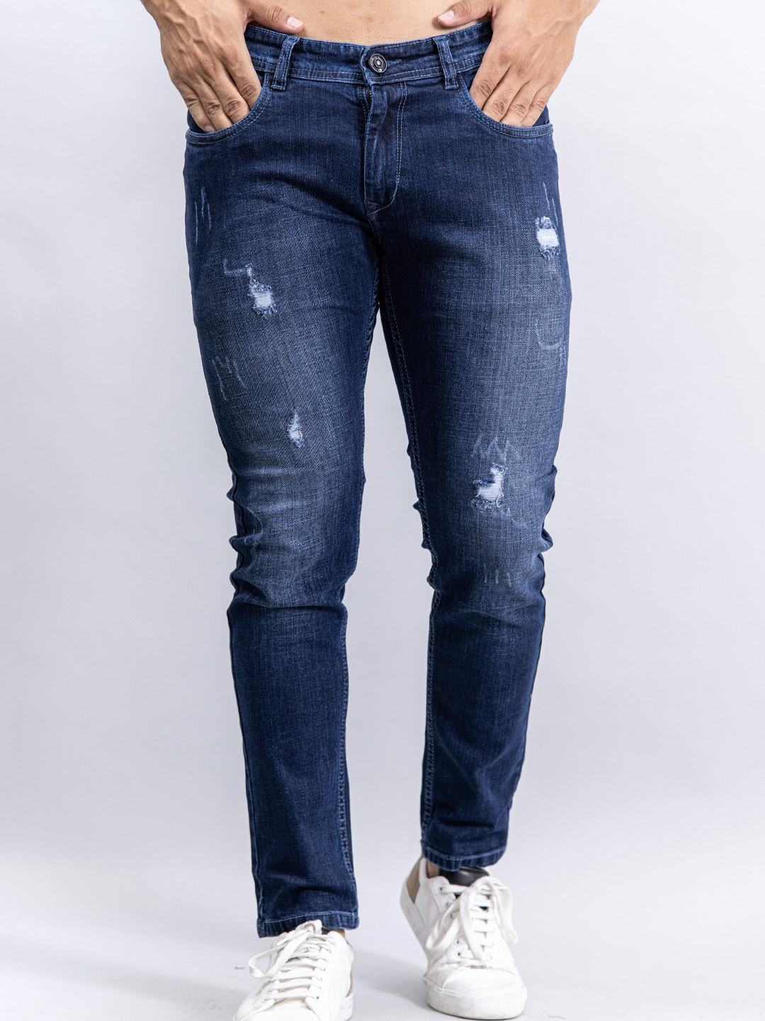 

Tistabene Men Blue Comfort Slim Fit Mildly Distressed Light Fade Stretchable Jeans