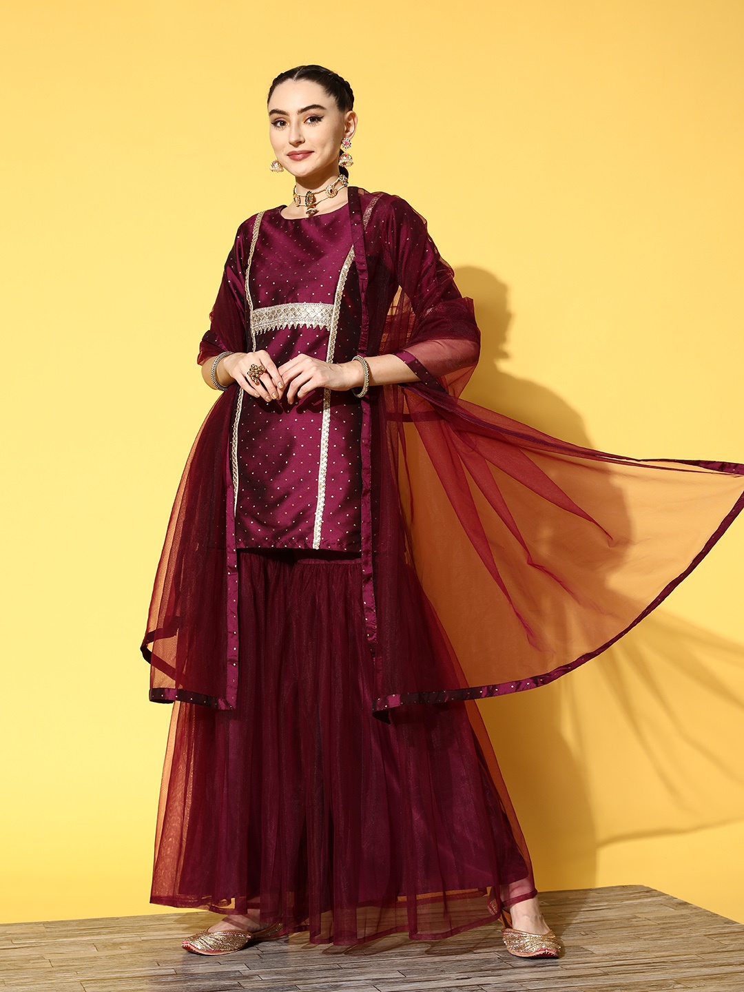 

Inddus Women Mauve Embroidered Kurti with Sharara & With Dupatta