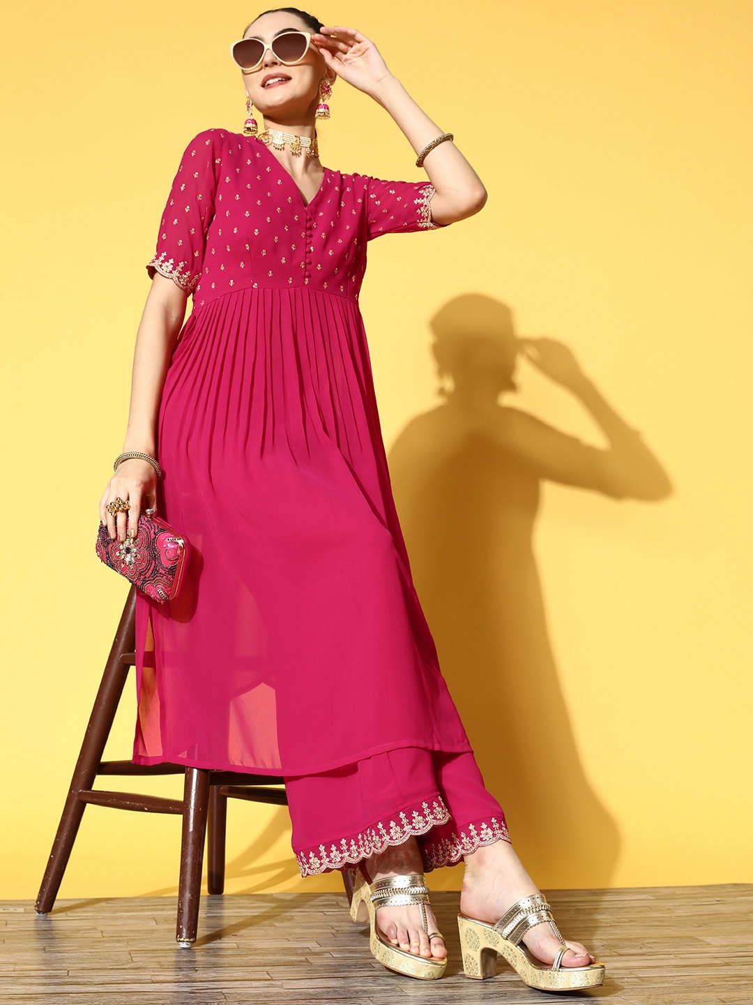 

Inddus Women Magenta Ethnic Motifs Embroidered Pleated Kurta with Palazzos