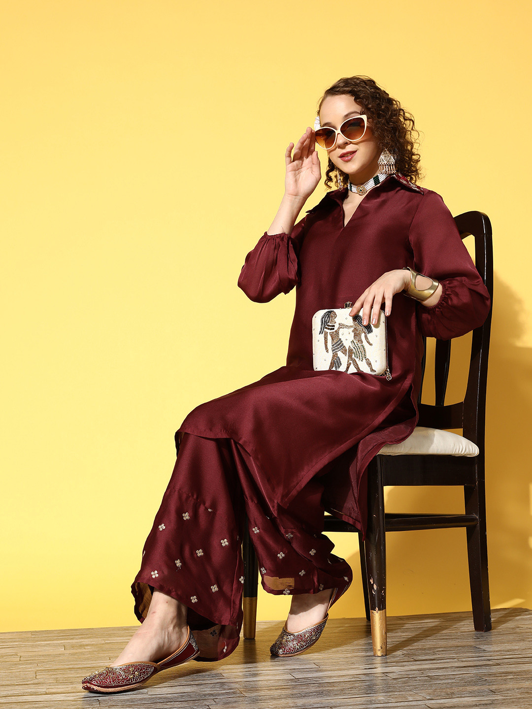 

Inddus Women Maroon Embroidered Kurta with Palazzos