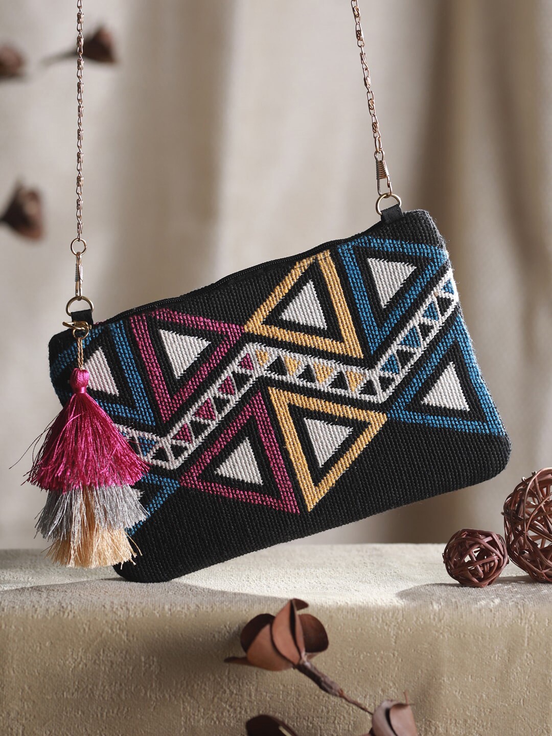 

Priyaasi Black Geometric Sling Bag with Tasselled