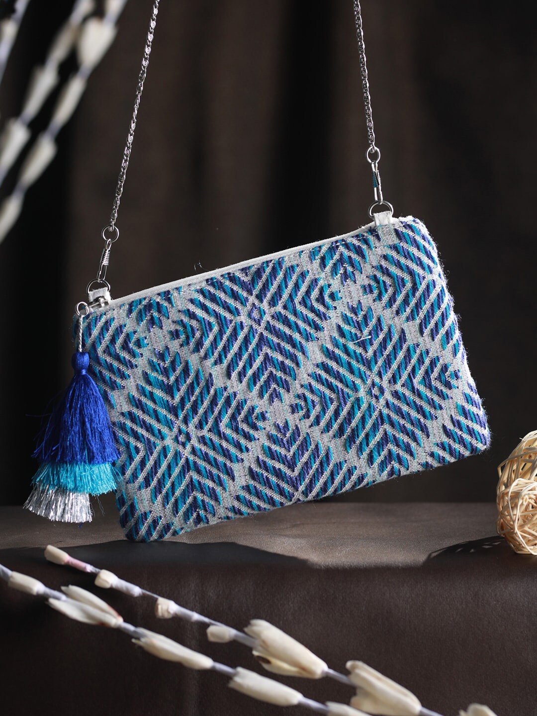 

Priyaasi Blue Geometric Sling Bag with Tasselled