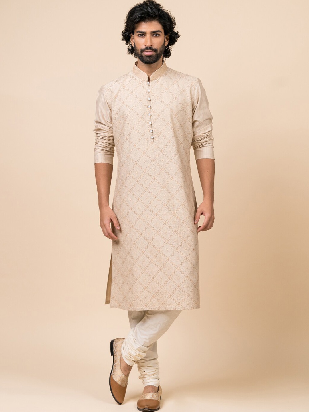 

Tasva Men Beige Ethnic Motifs Printed Kurta With Churidar