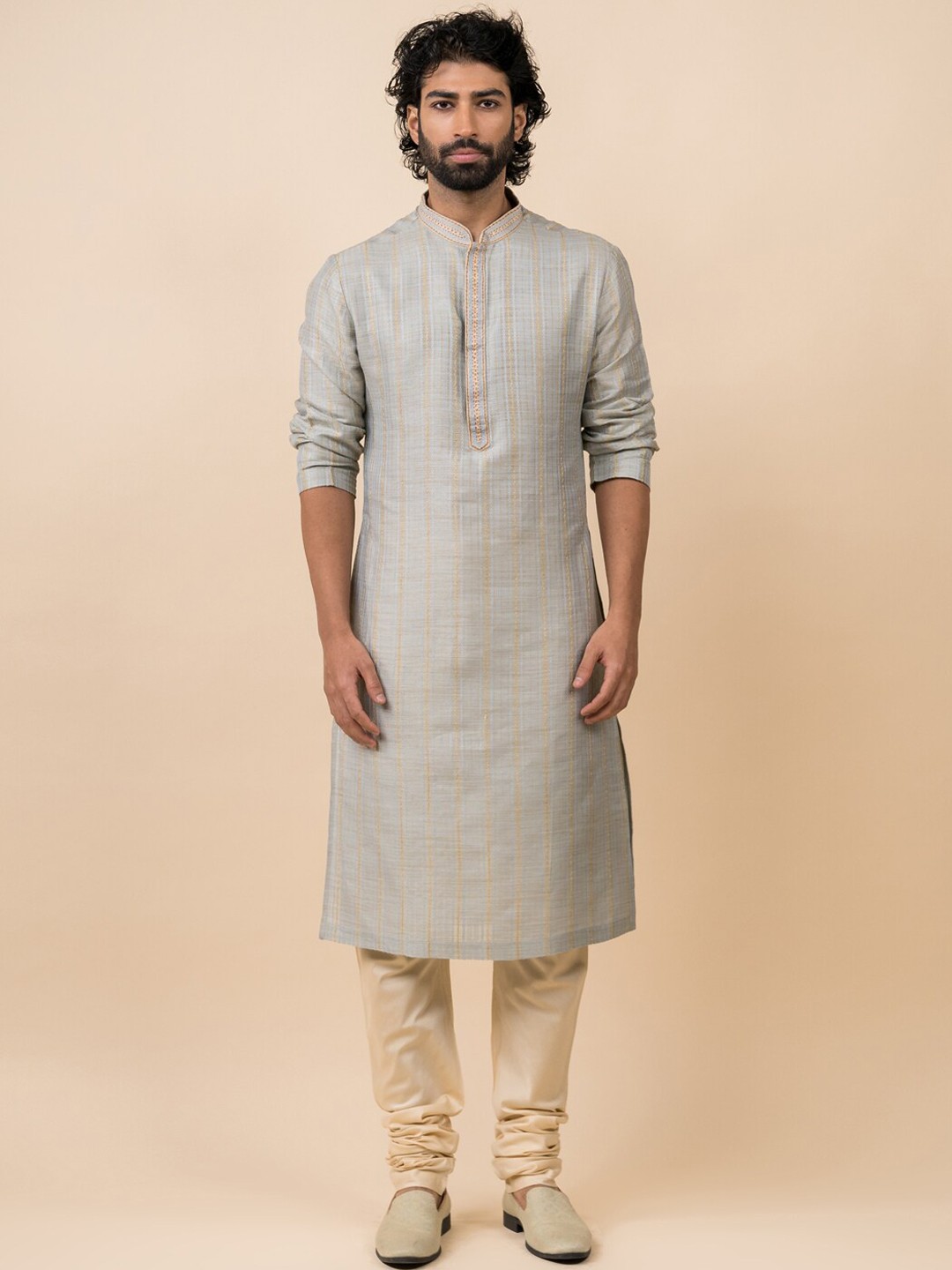 

Tasva Men Blue Striped Kurta With Churidar