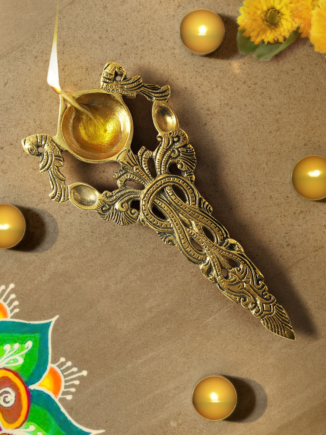 

Living scapes by Pantaloons Brass Pooja Aarti Diya Spoon, Gold