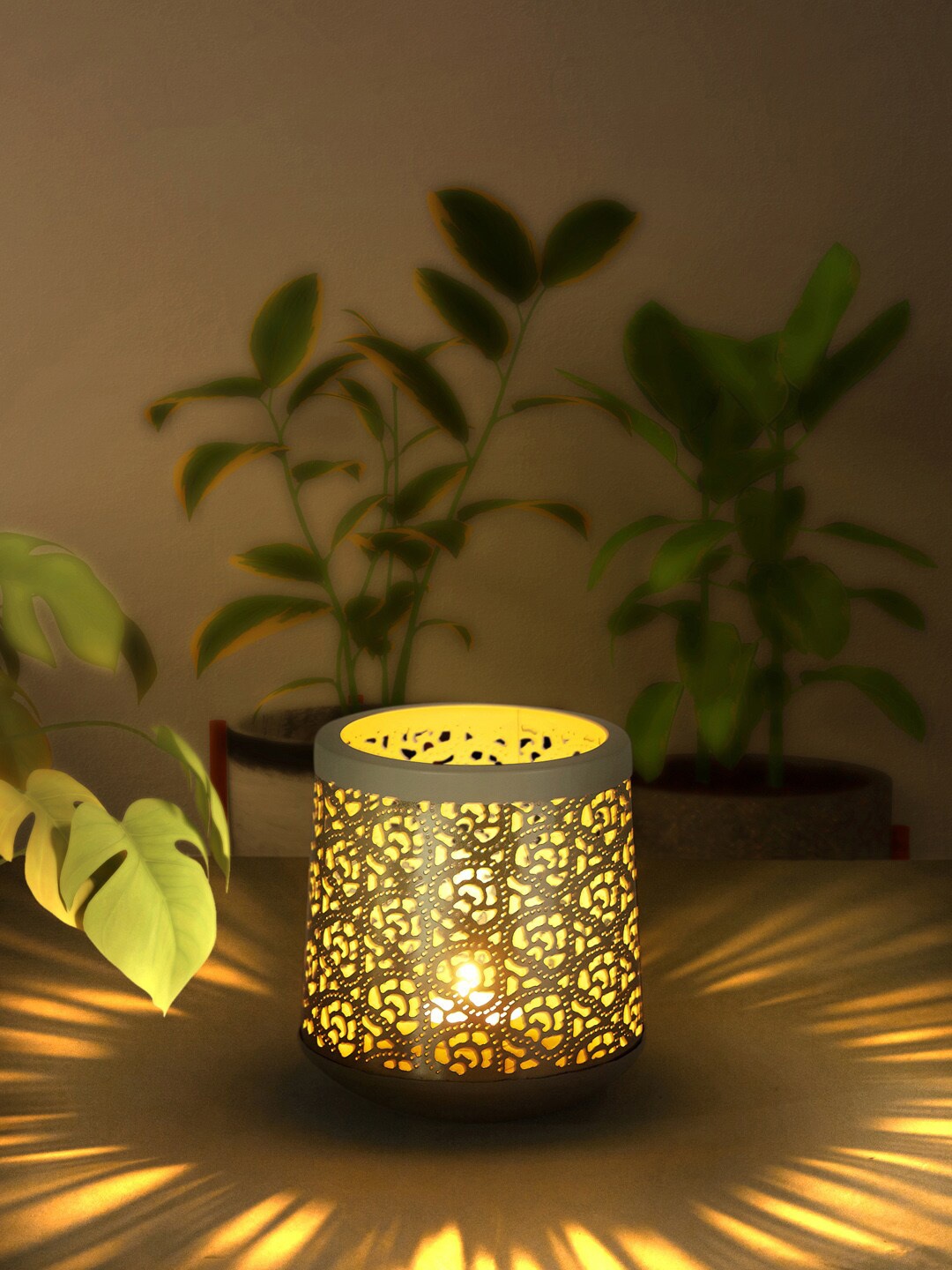 

Living scapes by Pantaloons Gold Candle Holders