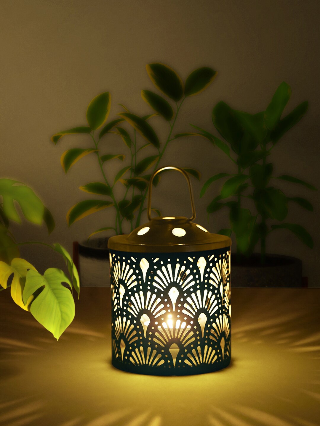 

Living scapes by Pantaloons Green Candle Holders