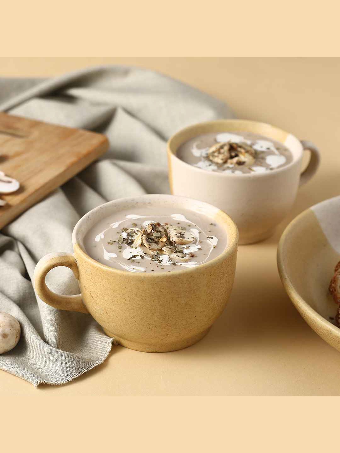 

Wonderchef Set Of 2 Yellow Dishwasher safe Stoneware Matte Cups 300 ml each