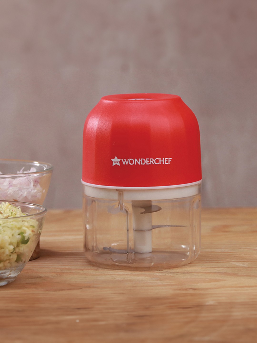 

Wonderchef Transparent & Red Zippy Cordless Chopper 250 ml With 3 Blades