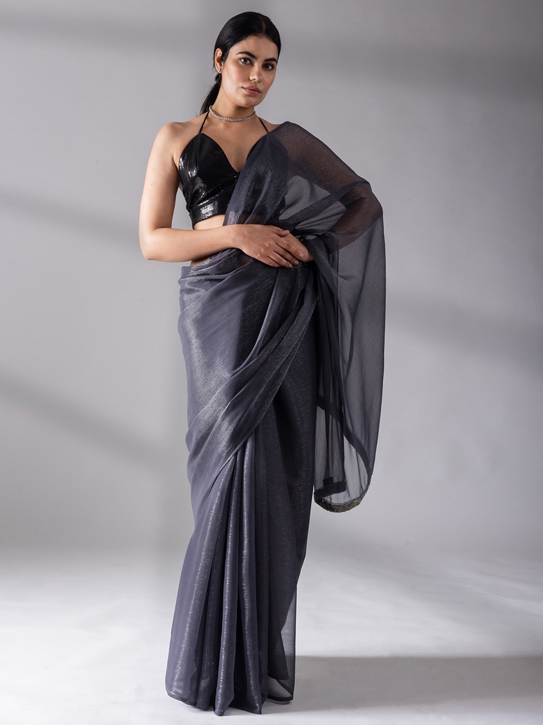 

Swtantra Grey & Silver-Toned Solid Saree