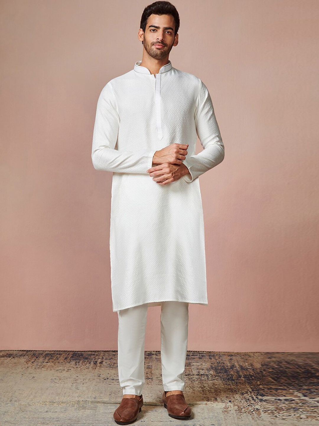 

Manyavar Men White Kurta with Churidar