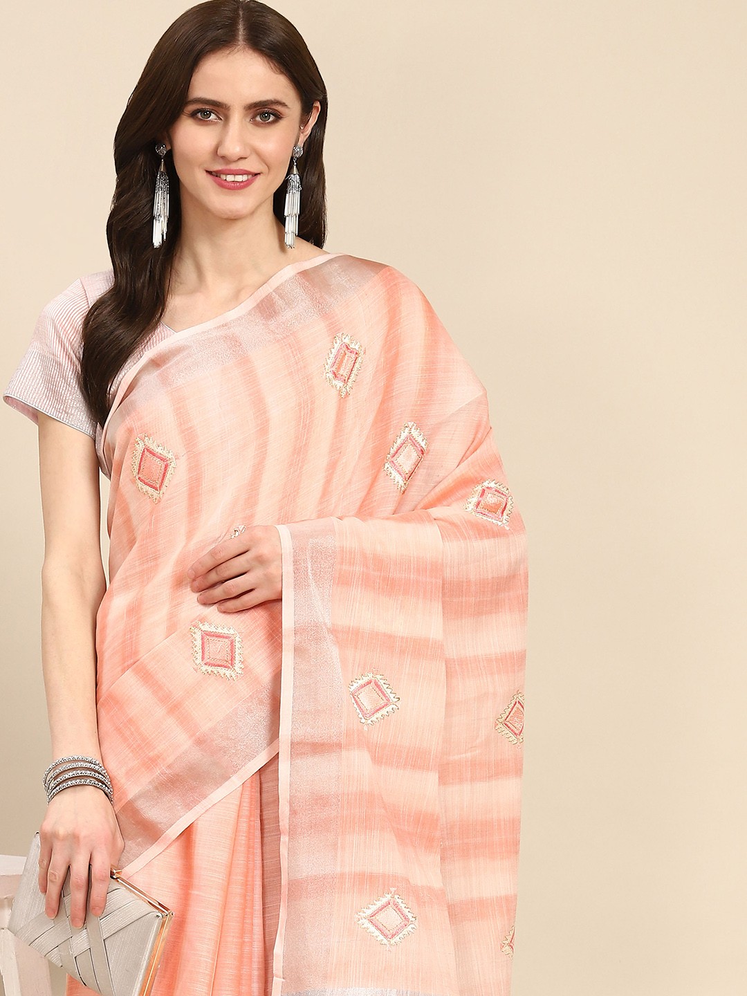 

Readiprint Fashions Peach-Coloured Embroidered Saree