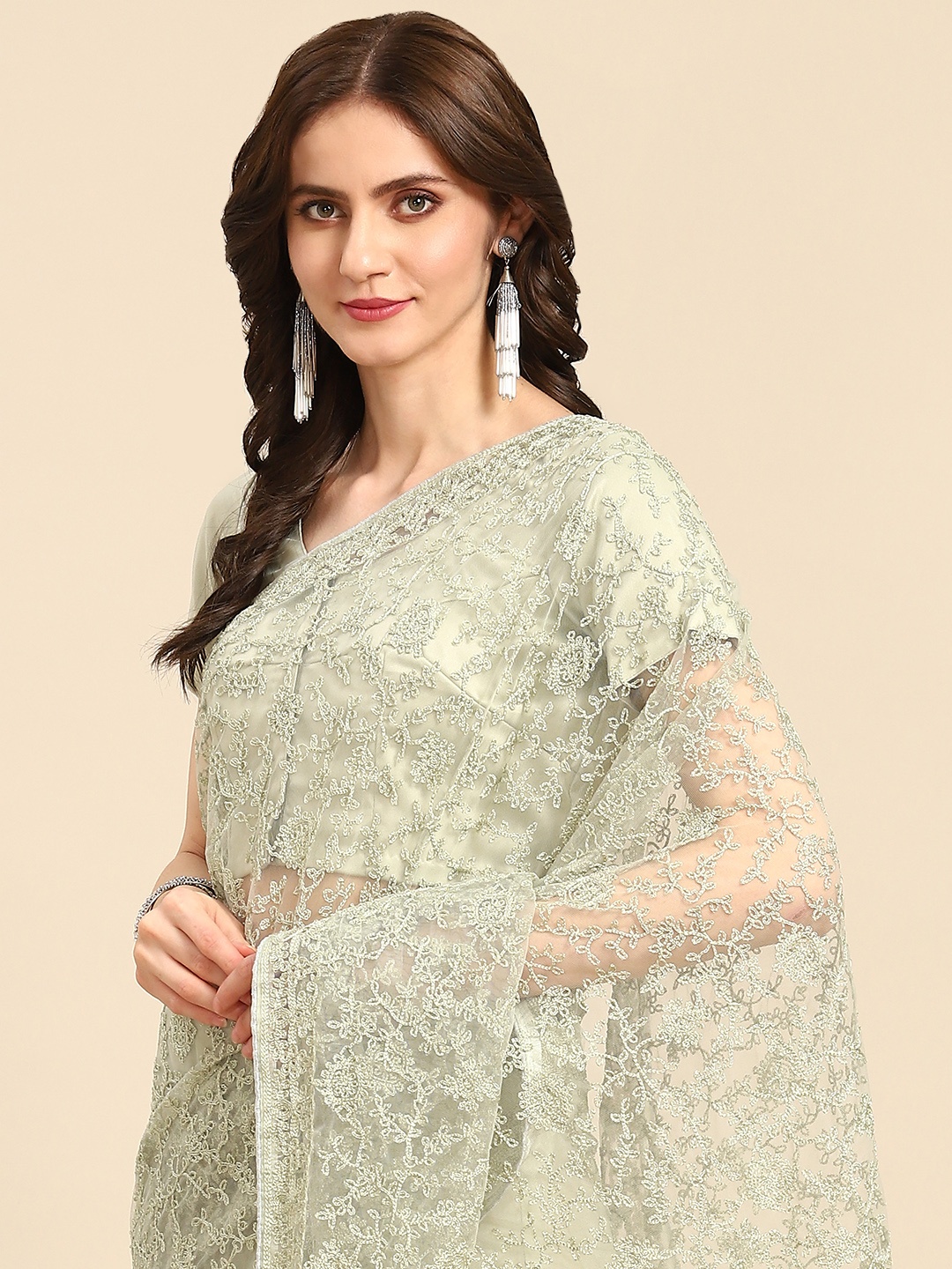 

Readiprint Fashions Green Floral Embroidered Net Saree