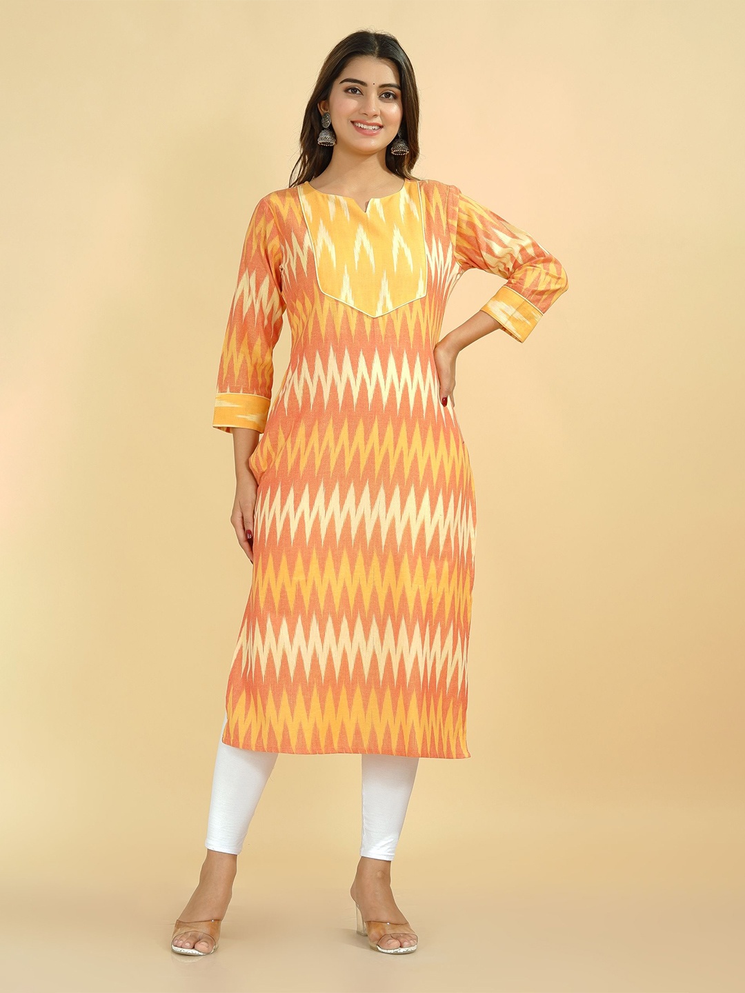 

Tetalee Women Orange Geometric Ikat Printed Straight Fit Cotton Kurta