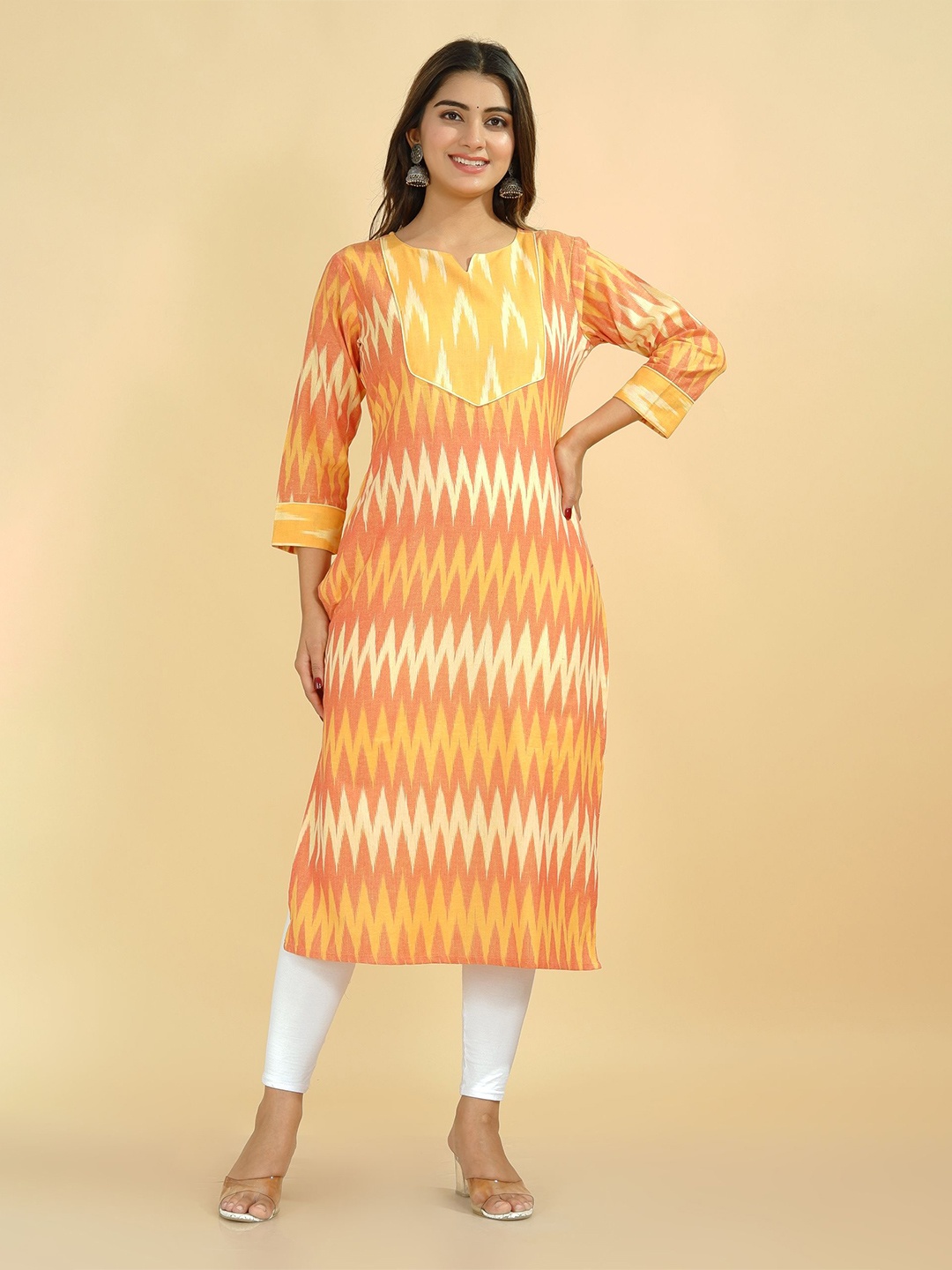 

Tetalee Women Orange & Yellow Chevron Ikat Printed Straight Fit Cotton Kurta