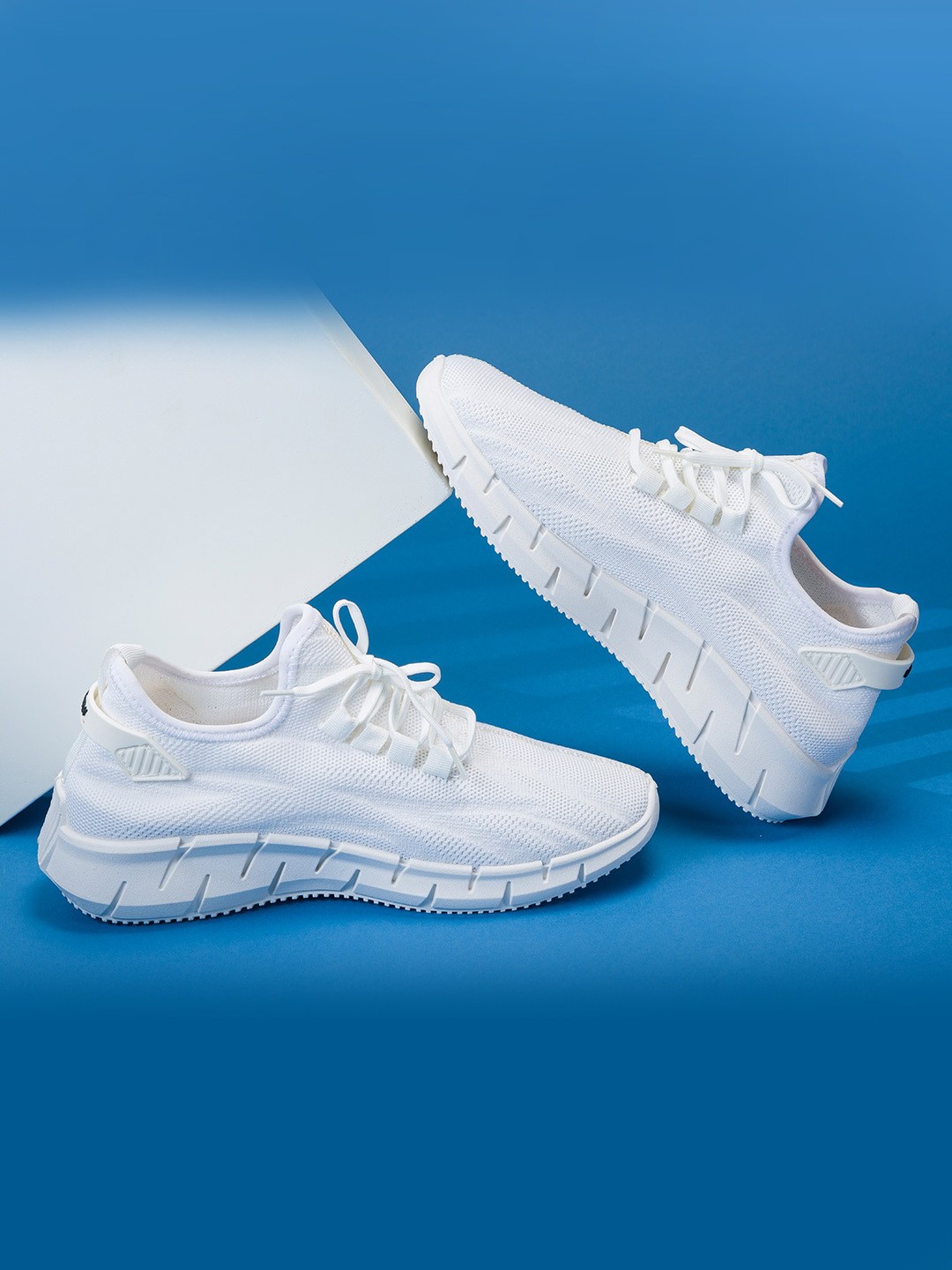 

RapidBox Men White Woven Design Sneakers