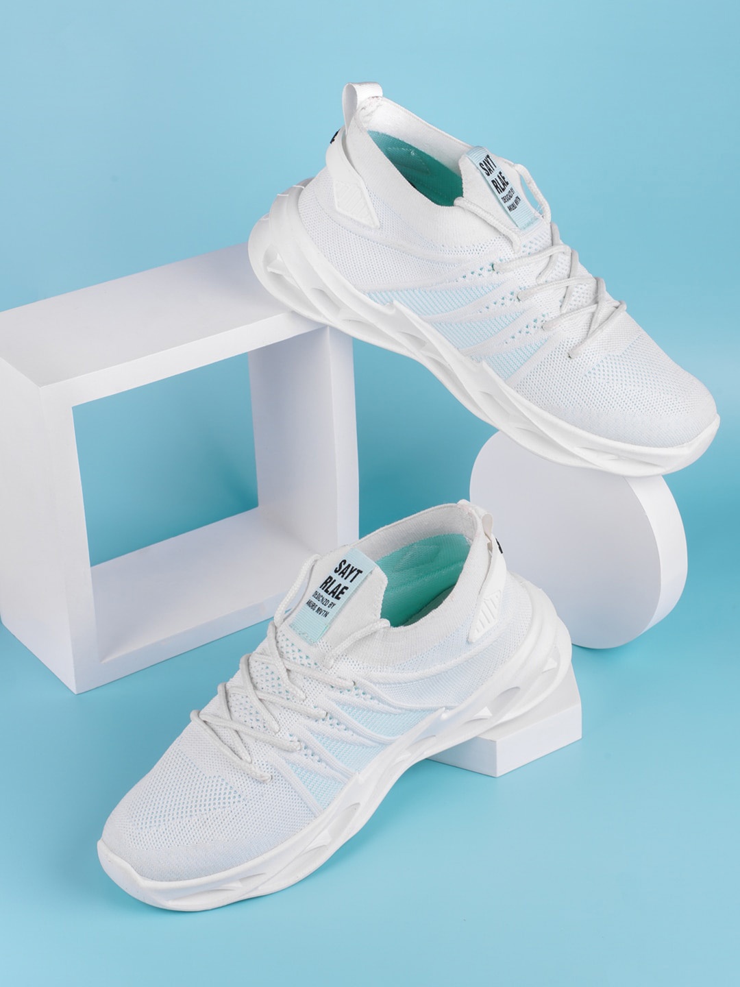 

RapidBox Men White Solid Sneakers
