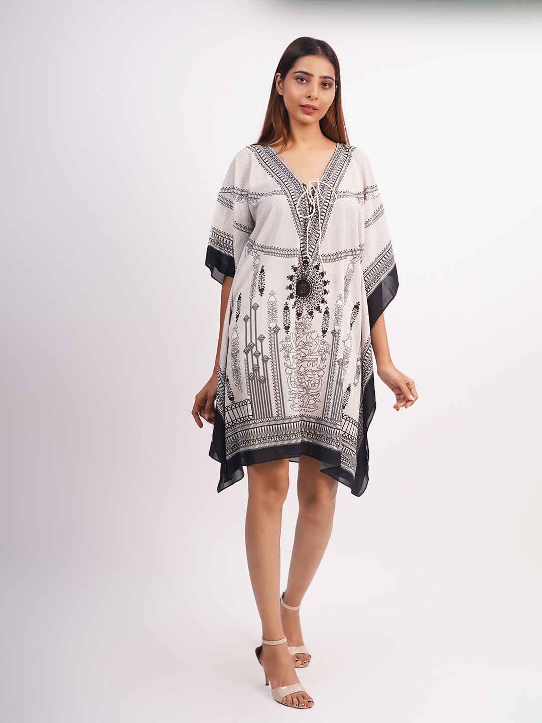 

Rajoria Instyle White & Black Tribal Georgette Ethnic Kaftan Dress