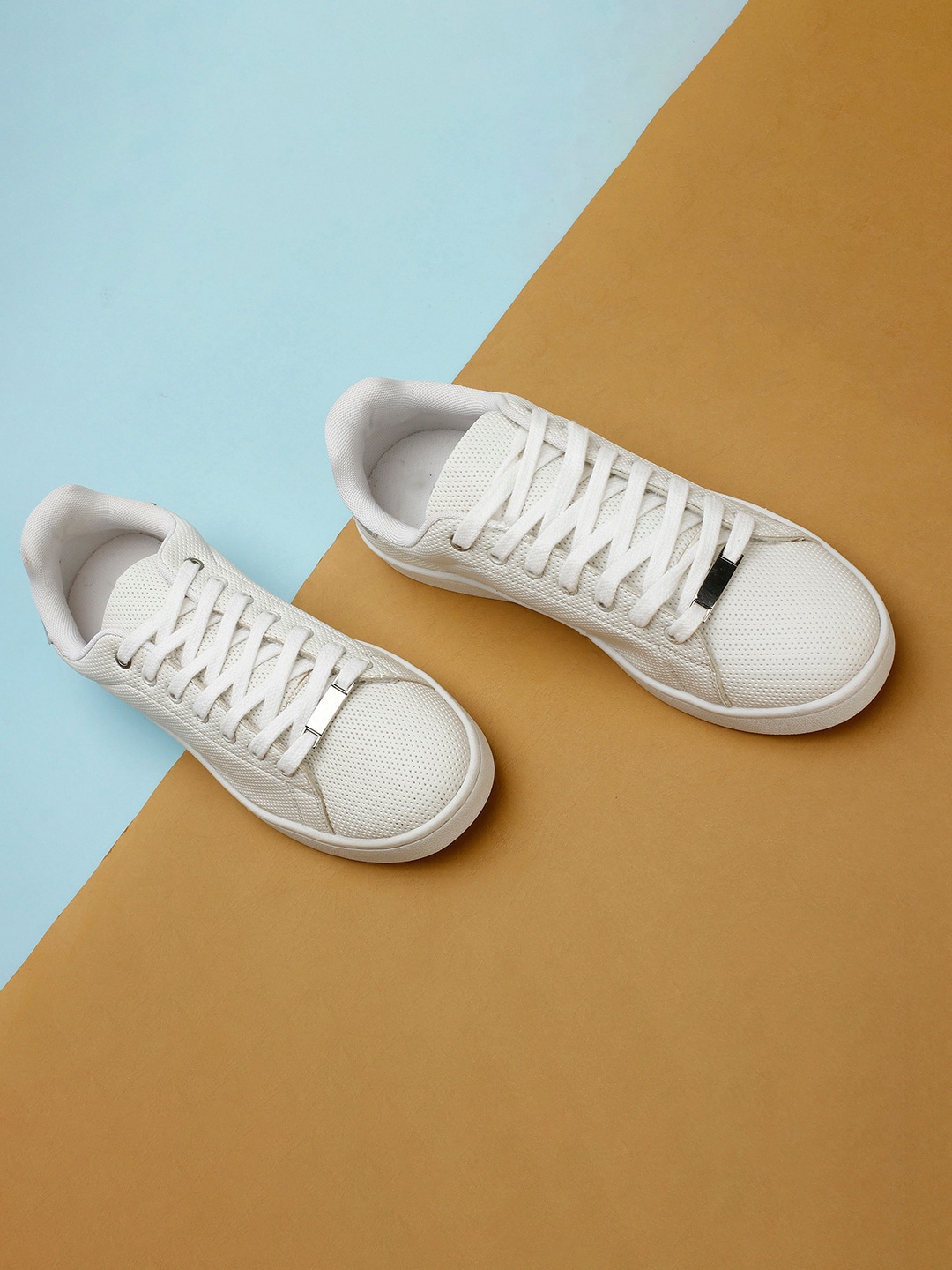 

max Women White Textured Sneakers