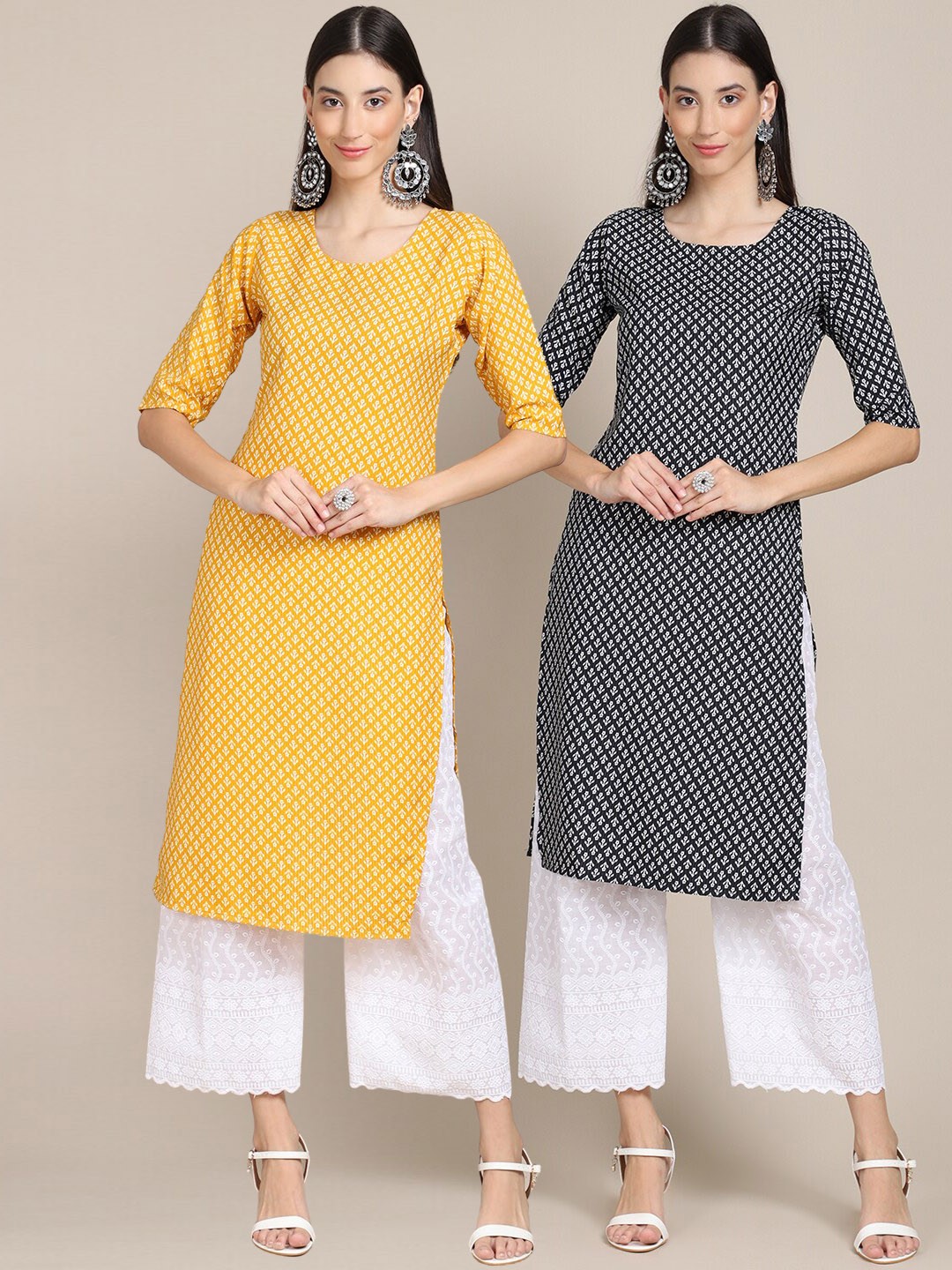 

Ethnic basket Women Pack Of 2 Yellow & Black Ethnic Motifs Printed Crepe Kurtas