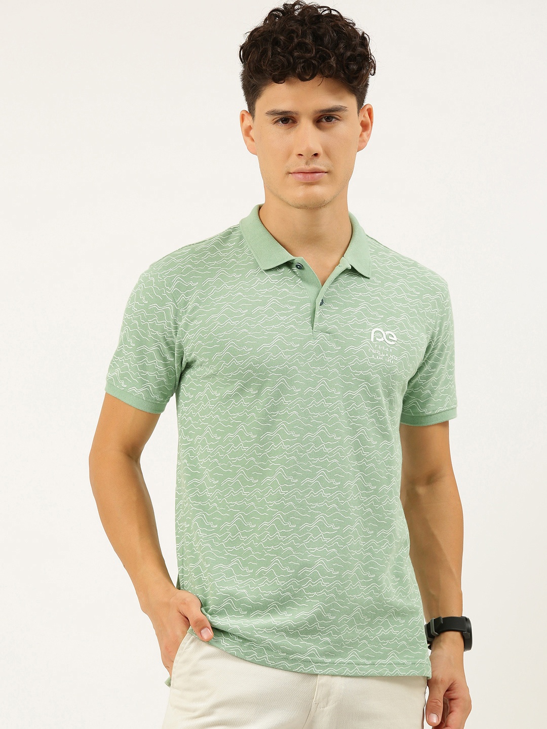 

Peter England Better Jeans Company Men Green & White Printed Polo Collar Slim Fit T-shirt