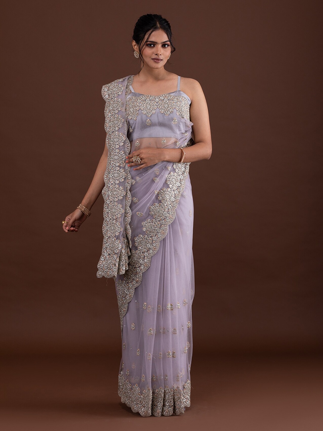

Koskii Lavender & White Floral Embroidered Supernet Saree