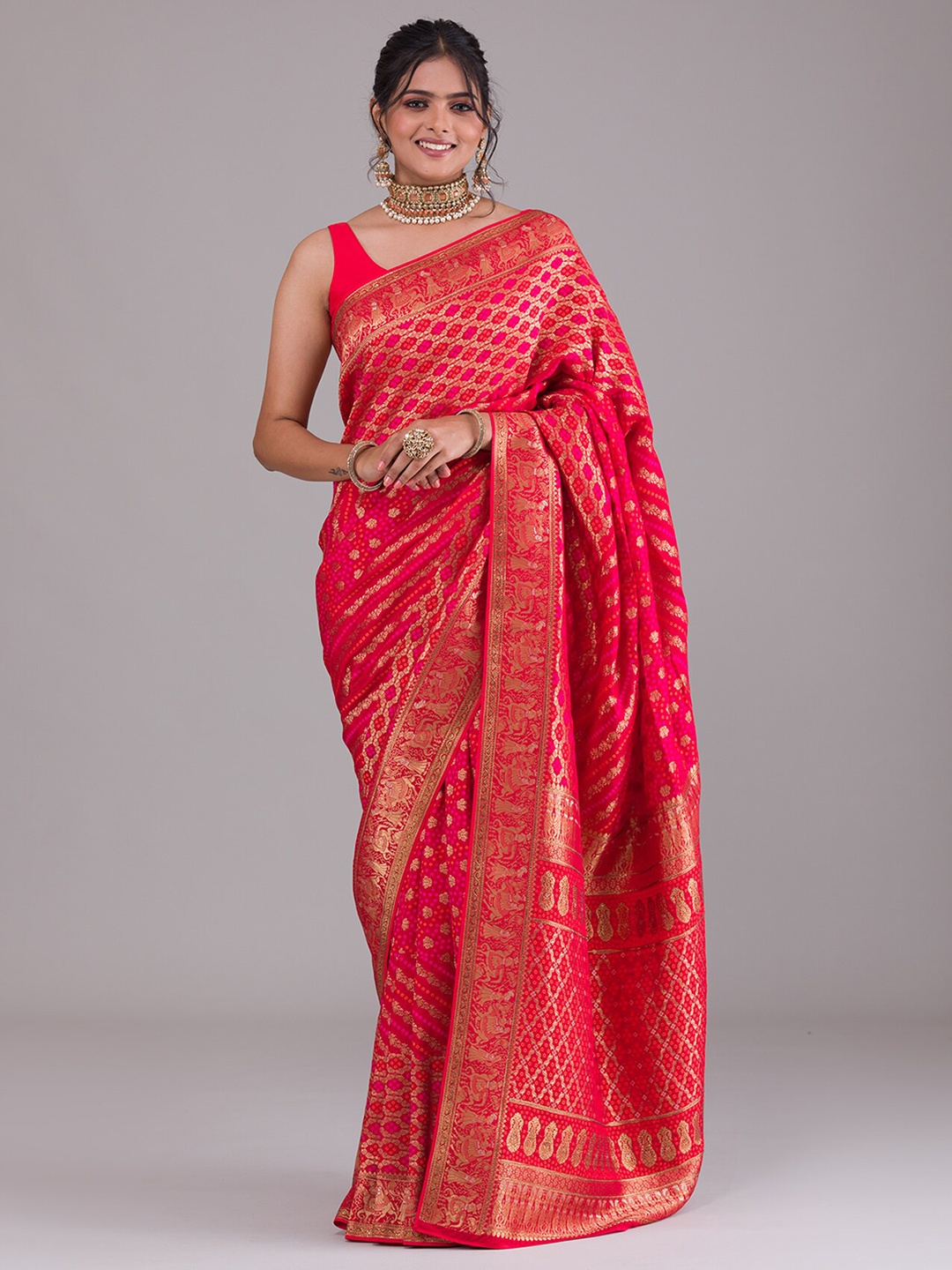 

Koskii Red & Gold-Toned Ethnic Motifs Zari Art Silk Saree