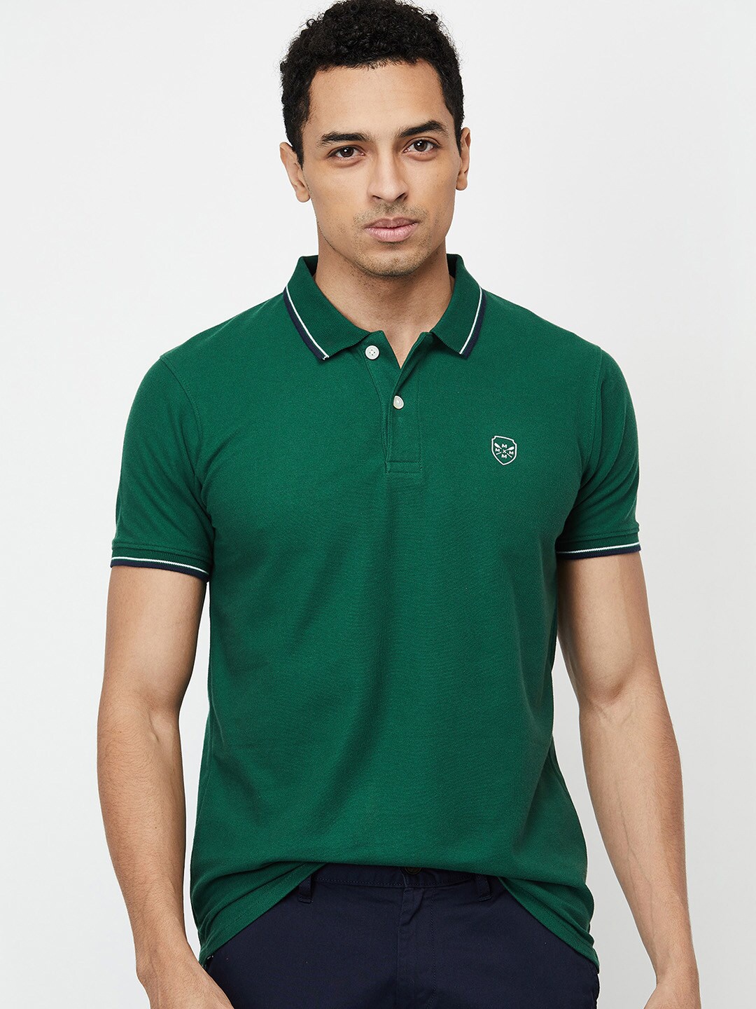 

max Men Green Solid Polo Collar T-shirt