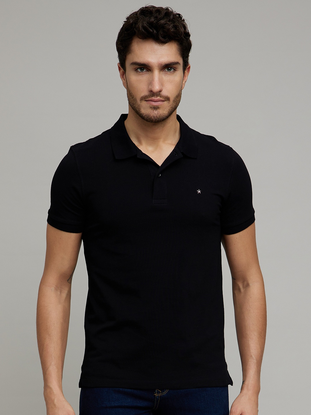 

Celio Men Black Polo Collar Slim Fit Cotton T-shirt