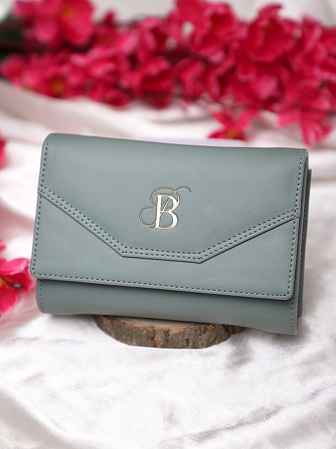 

Bag Pepper Blue Solid Foldover Clutch
