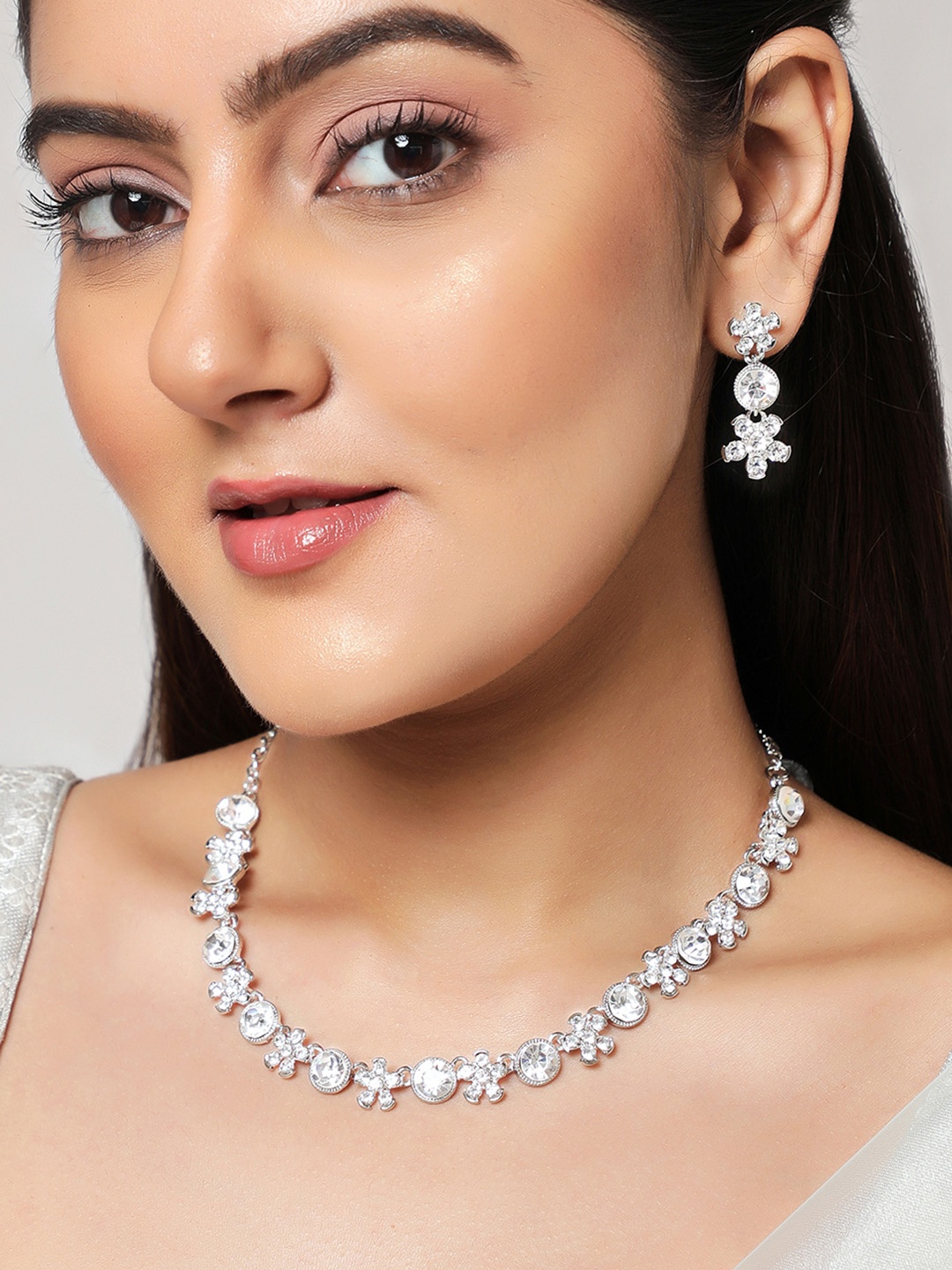 

Anouk Women Silver-Plated White AD-Studded Jewellery Set