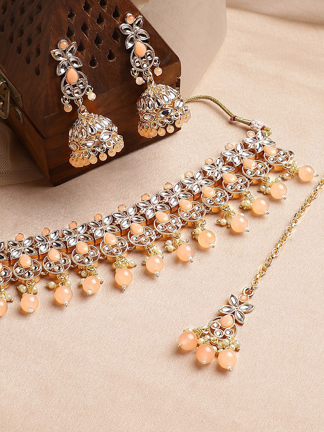 

Anouk Women Gold-Plated & Peach Kundan Stone Studded Jewellery Set