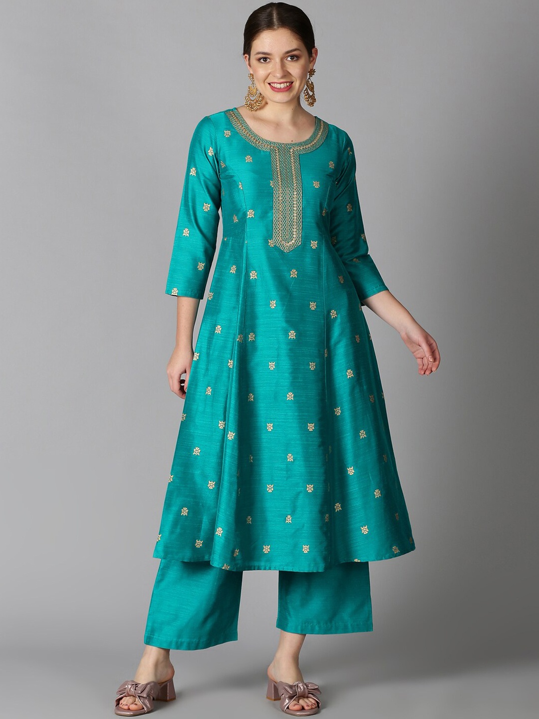 

Saffron Threads Women Turquoise Blue Art Silk Gold Printed Panelled Kurta with Palazzos