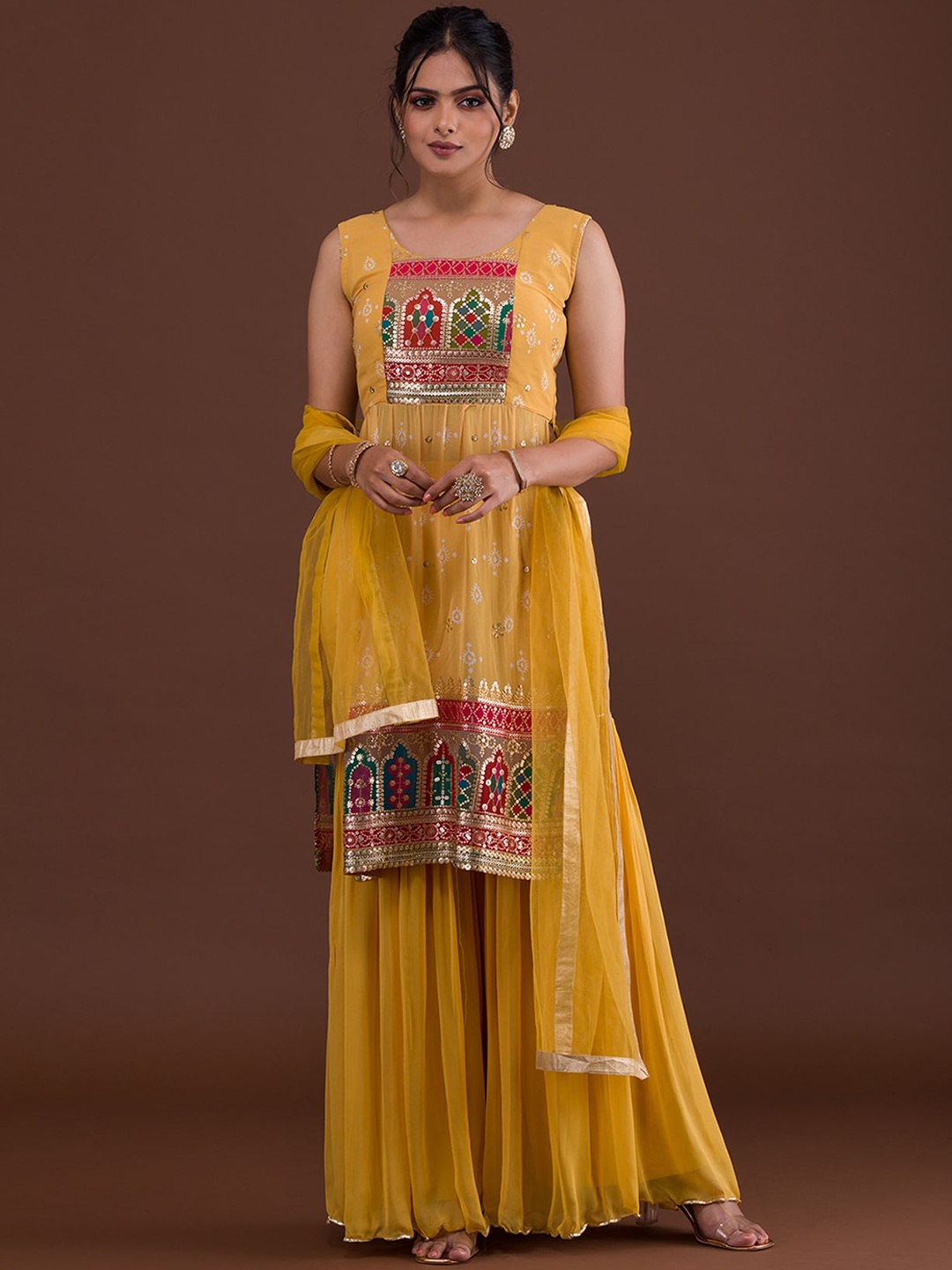 

Koskii Women Mustard Yellow Ethnic Motifs Printed Kurta with Sharara & With Dupattaa