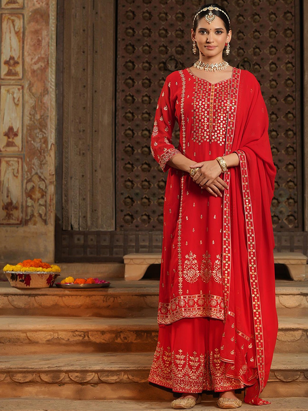 

SCAKHI Women Red & Gold Ethnic Motifs Embroidered Sequinned Kurta with Sharara & Dupatta