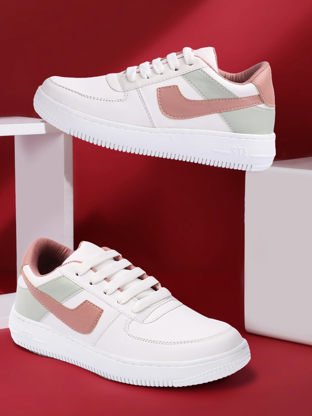 

Elibolz Women White Colourblocked Sneakers
