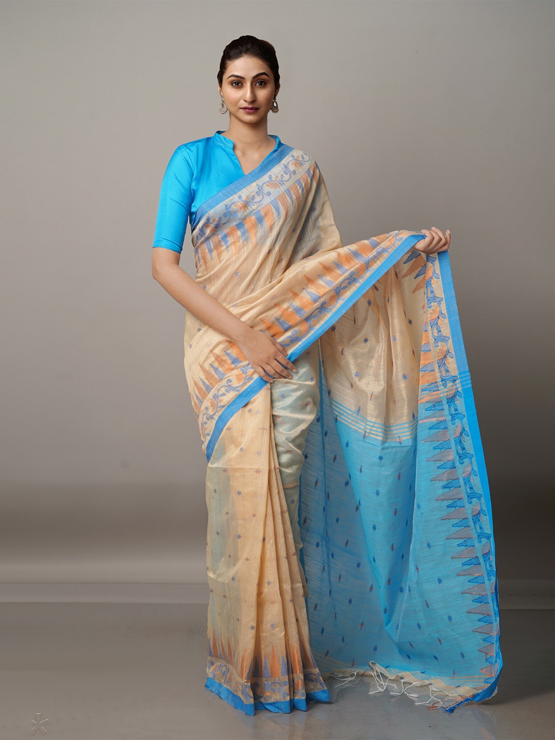 

Unnati Silks Cream-Coloured & Blue Zari Silk Cotton Jamdani Saree