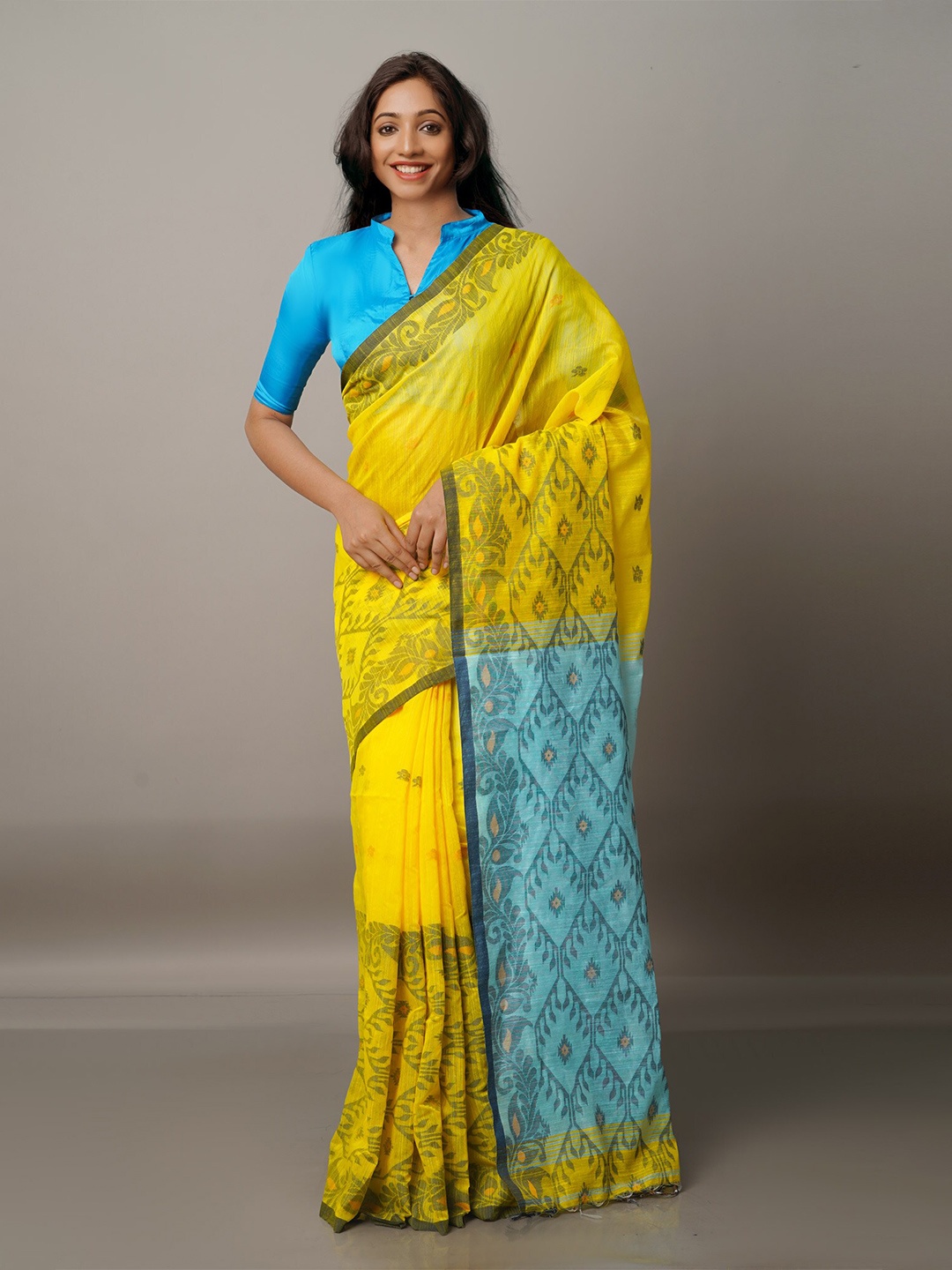 

Unnati Silks Yellow & Blue Zari Silk Cotton Jamdani Saree