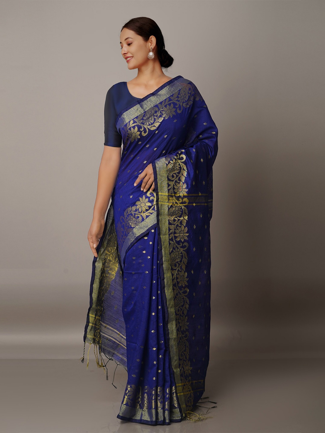 

Unnati Silks Blue & Gold-Toned Ethnic Motifs Zari Silk Cotton Jamdani Saree