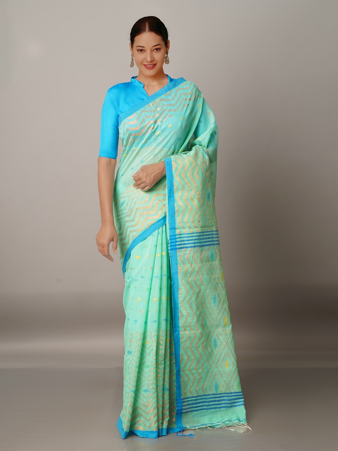 

Unnati Silks Green & Blue Woven Design Handloom Jamdani Saree