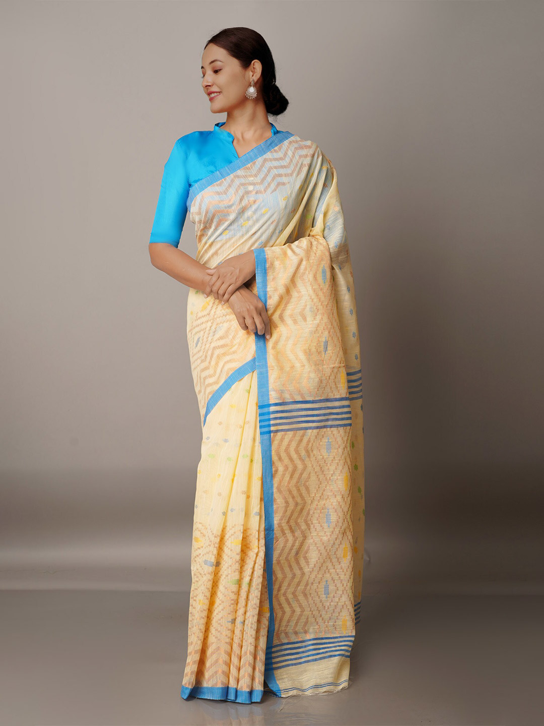 

Unnati Silks Peach-Coloured & Blue Ethnic Motifs Zari Silk Cotton Jamdani Saree