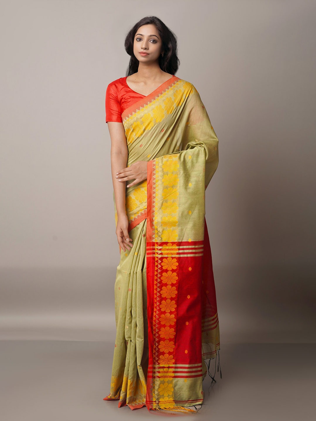 

Unnati Silks Green & Orange Ethnic Motifs Silk Cotton Jamdani Saree
