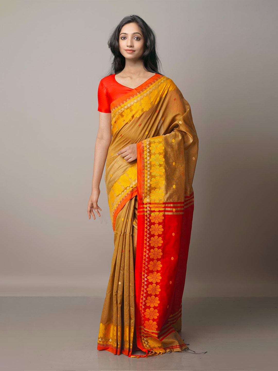 

Unnati Silks Mustard & Orange Ethnic Motifs Zari Silk Cotton Jamdani Saree