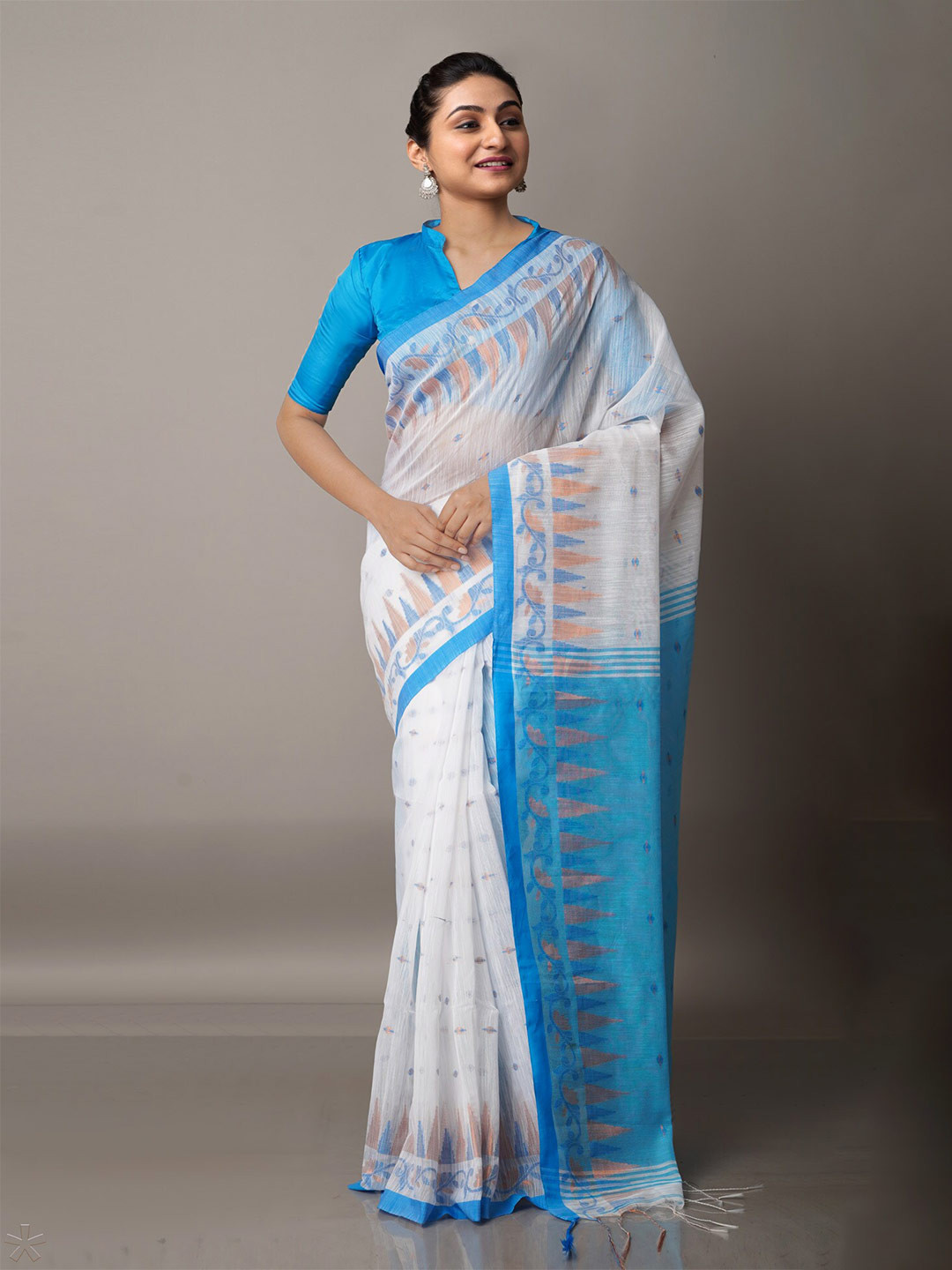 

Unnati Silks White & Blue Woven Design Zari Silk Cotton Jamdani Saree