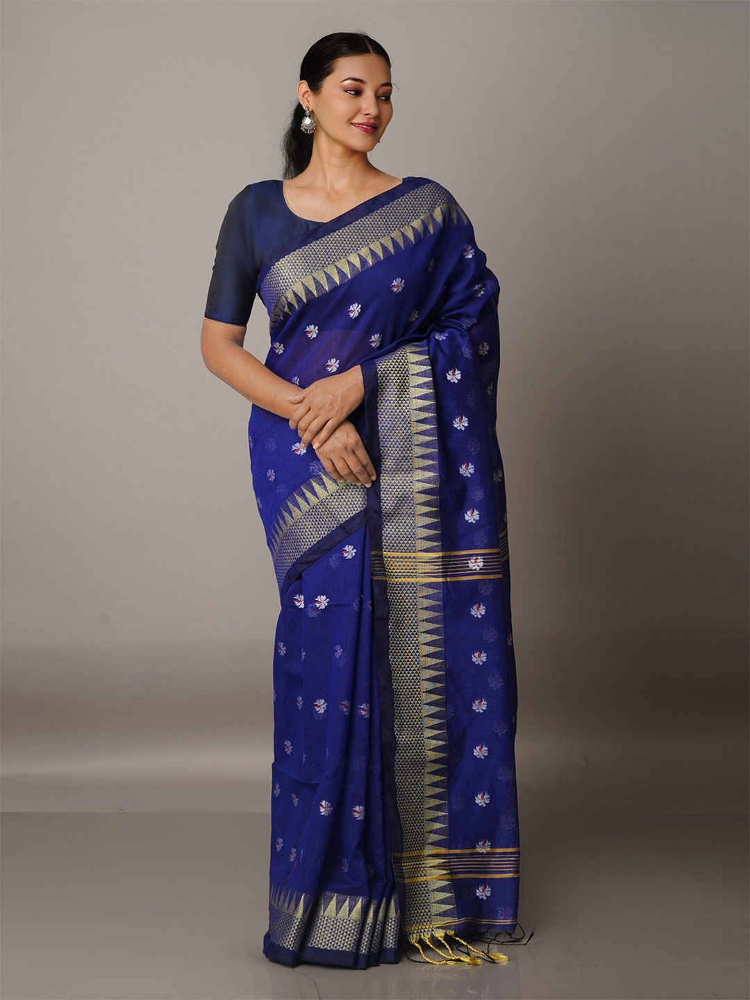 

Unnati Silks Blue & Gold-Toned Woven Design Zari Silk Cotton Jamdani Saree